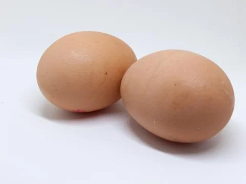 Two Eggs on White Stock Photos