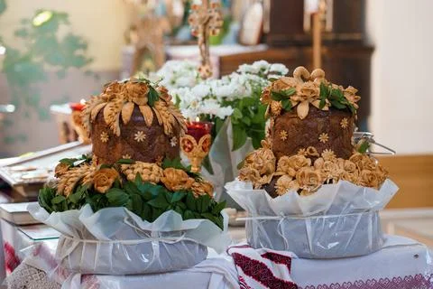 Two elaborately crafted Ukrainian Easter breads adorned with golden pysanky-s Stock Photos