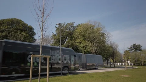 Two electric buses pass each other in Bayonne, France Stock-Footage 127255808
