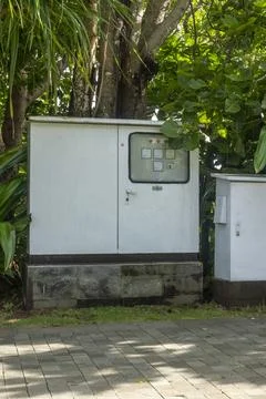 Two electrical boxes in the garden Foto stock