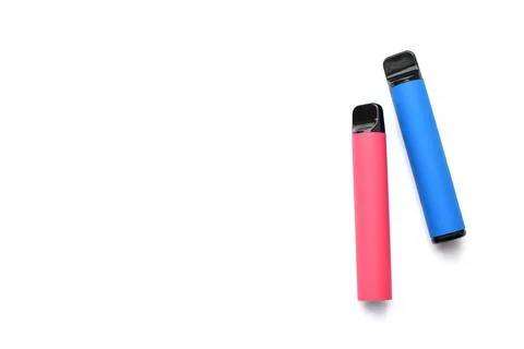 Two electronic cigarettes on a white background. Place for your text. Foto stock