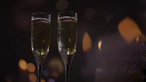 Two elegant champagne flutes Stock Footage 346298738