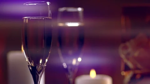 Two elegant glasses of champagne rotating Stock Footage 117359657