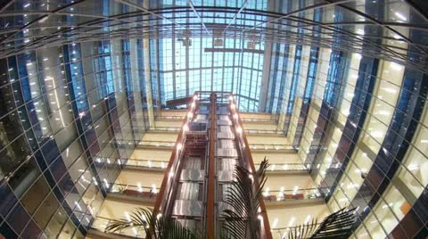 Two elevators go to business-center where light in windows of offices is shone Stock Footage 10808255