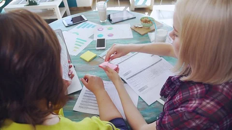 Two employees of marketing department plan an advertising campaign. Stock Footage