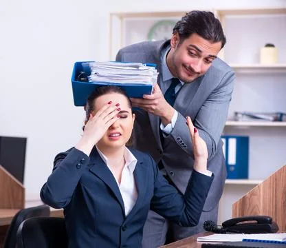 Two employees working in the office Stock Photos