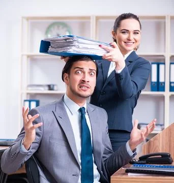 Two employees working in the office Stock Photos