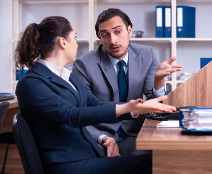 Two employees working in the office Stock Photos