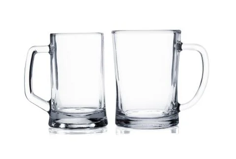 Two empty beer mugs on white Stock Photos