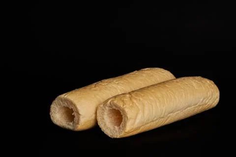 Two empty buns isolated on black background Stock-Fotos