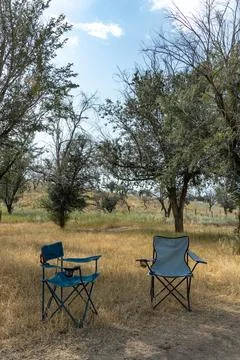 Two empty camping chairs. Outdoor furniture Stock Photos