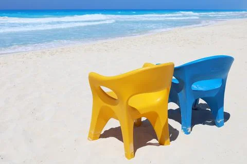 Two empty chairs and paradise sea beach Stock Photos