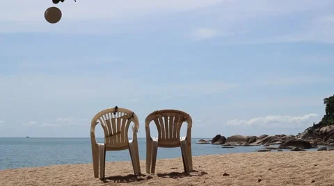 Two Empty Chairs on the Beach Stock Footage 55629253
