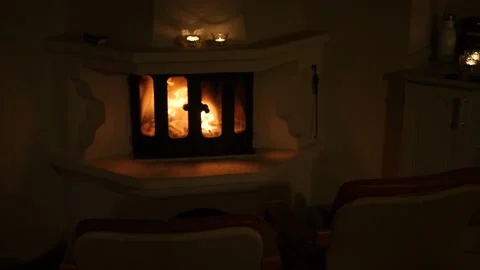 Two Empty Chairs In Front of Brick Fireplace with Candles, Cozy and Romantic Stock Footage 172163084