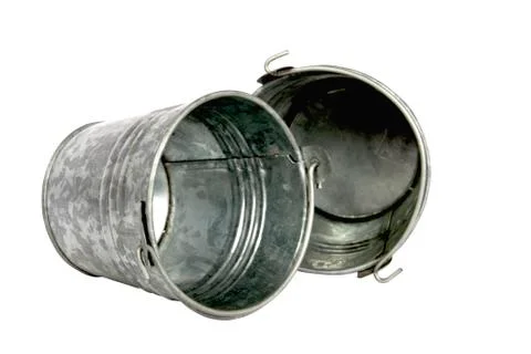 Two empty galvanized buckets with metal handles Stock Photos