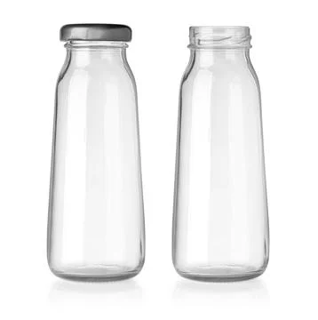 Two empty glass bottles standing on white background Stock Photos