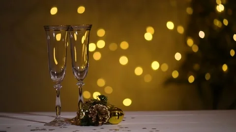 Two empty glass of Champagne over blur spots light Stock Footage 139923596