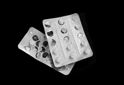 Two empty packaging of tablets. Blister of white pharmacy pills. Isolated b.. Stock-Fotos