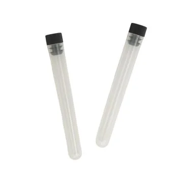 Two empty plastic test tubes with black caps isolated on white background. La Stock Photos