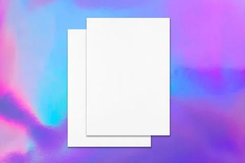 Two empty poster mockups lying on top of each other on holographic background Stock Photos
