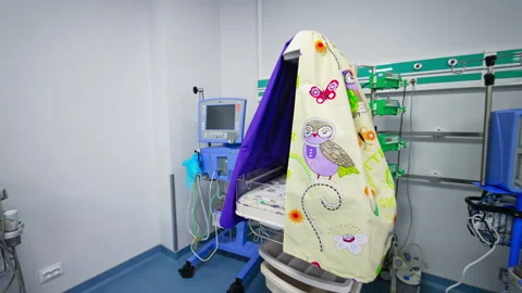 Two empty reanimation cribs with blue canopies.  Stock Footage 169683718