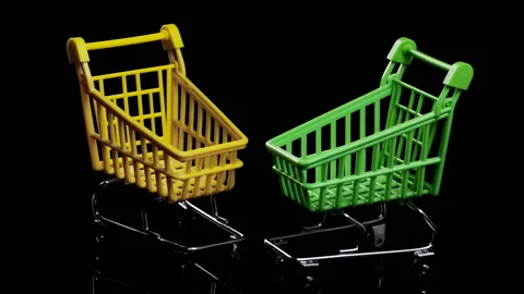 Two empty shopping baskets on a black background, shopping concept. rotating Видео 144253771