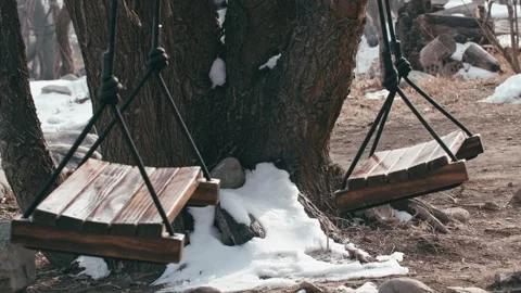 Two empty swinging swings Stock Footage 256863451