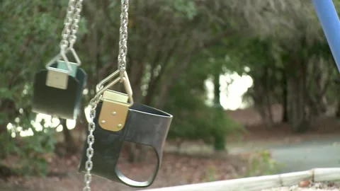 Two Empty Swings Swinging 스톡 동영상 188362816