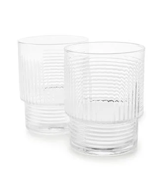 Two empty textured drinking glasses on white background Stock Photos