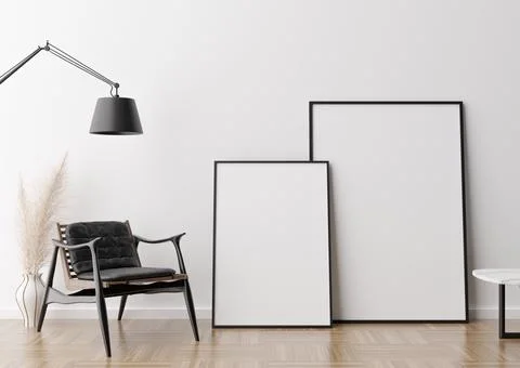 Two empty vertical picture frames in modern living room. Mock up interior in  Foto stock