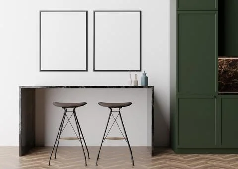 Two empty vertical picture frames on white wall in modern kitchen. Mock up in Stock Photos