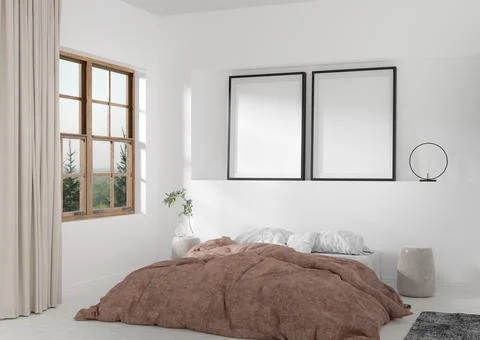 Two empty vertical picture frames on white wall in modern bedroom. Mock up in Foto stock