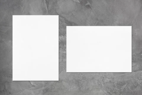 Two empty white vertical and horizontal rectangle poster mockups Stock Photos