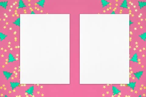 Two empty white vertical rectangle poster mockup pink christmas background Stock Photos