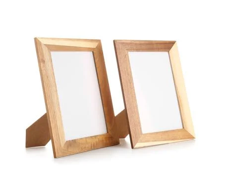 Two empty wooden photo frames on white background Stock Photos
