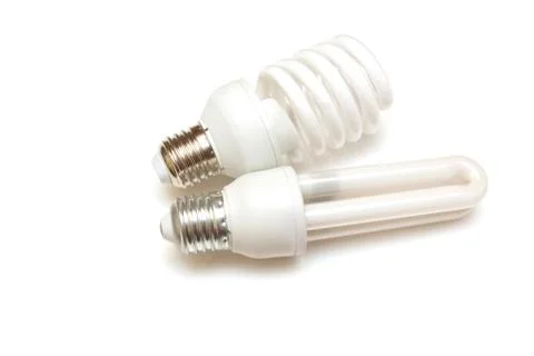 Two energy-saving lamps Stock Photos