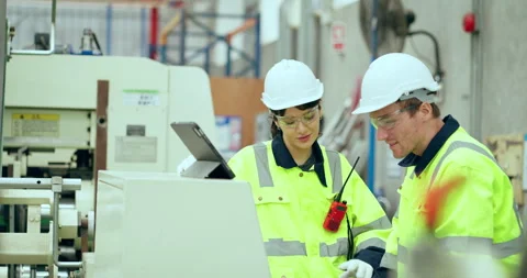 Two Engineer checking machine at factory. Stock Footage 249989134