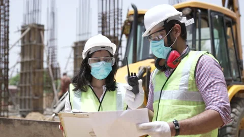 Two Engineer Inspecting Building Developer On Construction Site. Видео 162020340