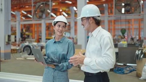Two engineer manager leader and woman assistant holding laptop and shaking hands Видео 237008133