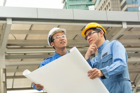 Two Engineer or Architect discuss Stock Photos