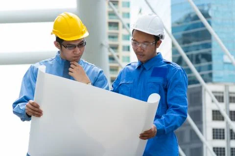 Two Engineer or Architect discuss Stock Photos