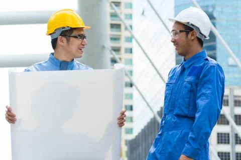 Two Engineer or Architect discuss Stock Photos