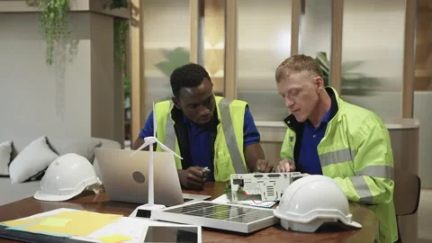 Two engineer or technician are consult the basics of wind turbines Stock Footage 157597805