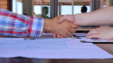 Two engineers of the builder check the drawings Video stock 92461042