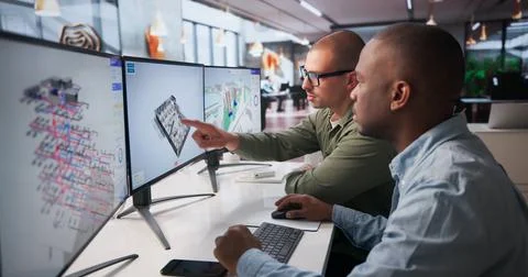 Two Engineers Collaborate On 3D BIM Software For Construction Planning. 스톡 사진