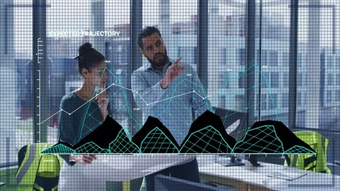 Two engineers at desk overlay appearing terrain plot man pointing woman studying Stockbeeldmateriaal 333233185