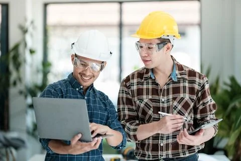 Two engineers discussion and planning about project. Brainstorming of engineers Stock Photos