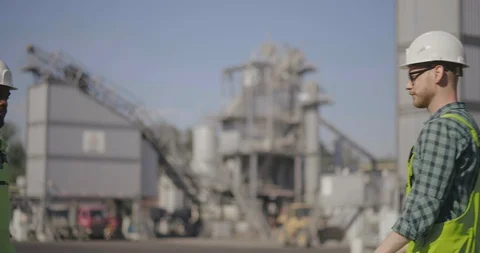 Two engineers shaking hand on building site Stock Footage 114331965