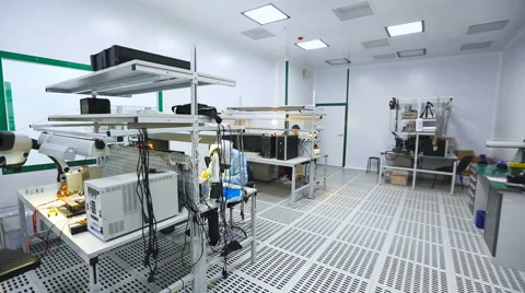 Two Engineers Sitting at Their Workstations and Learn the Details of a Stock Footage 60583176