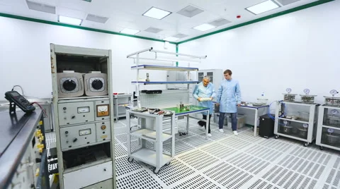 Two Engineers at the Tech Laboratory Testing Devices Instruments Video stock 60575315